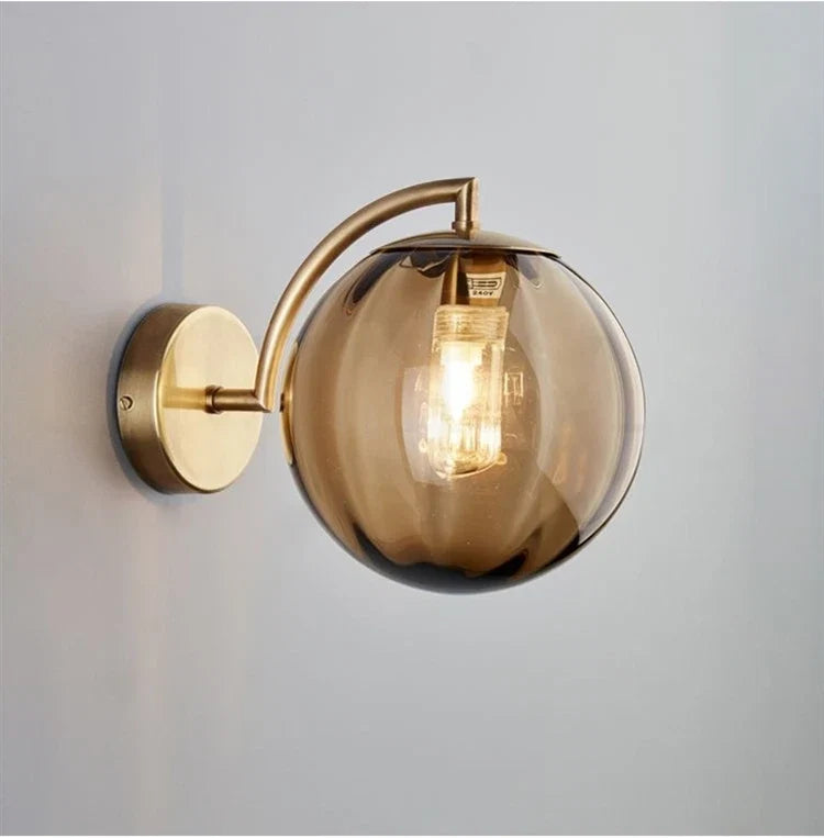 Glass Globe and Brass Wall Lamp