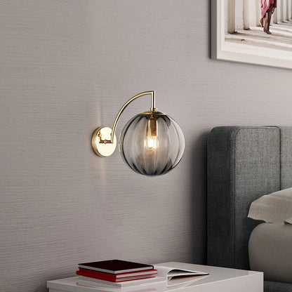 Glass Globe and Brass Wall Lamp